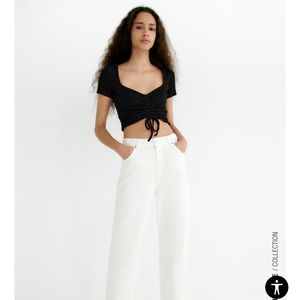 Black cropped shirt with ruched detailing